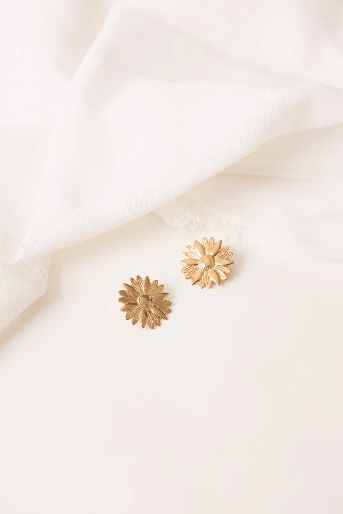Boucles Marguerite Un de ces quatre 