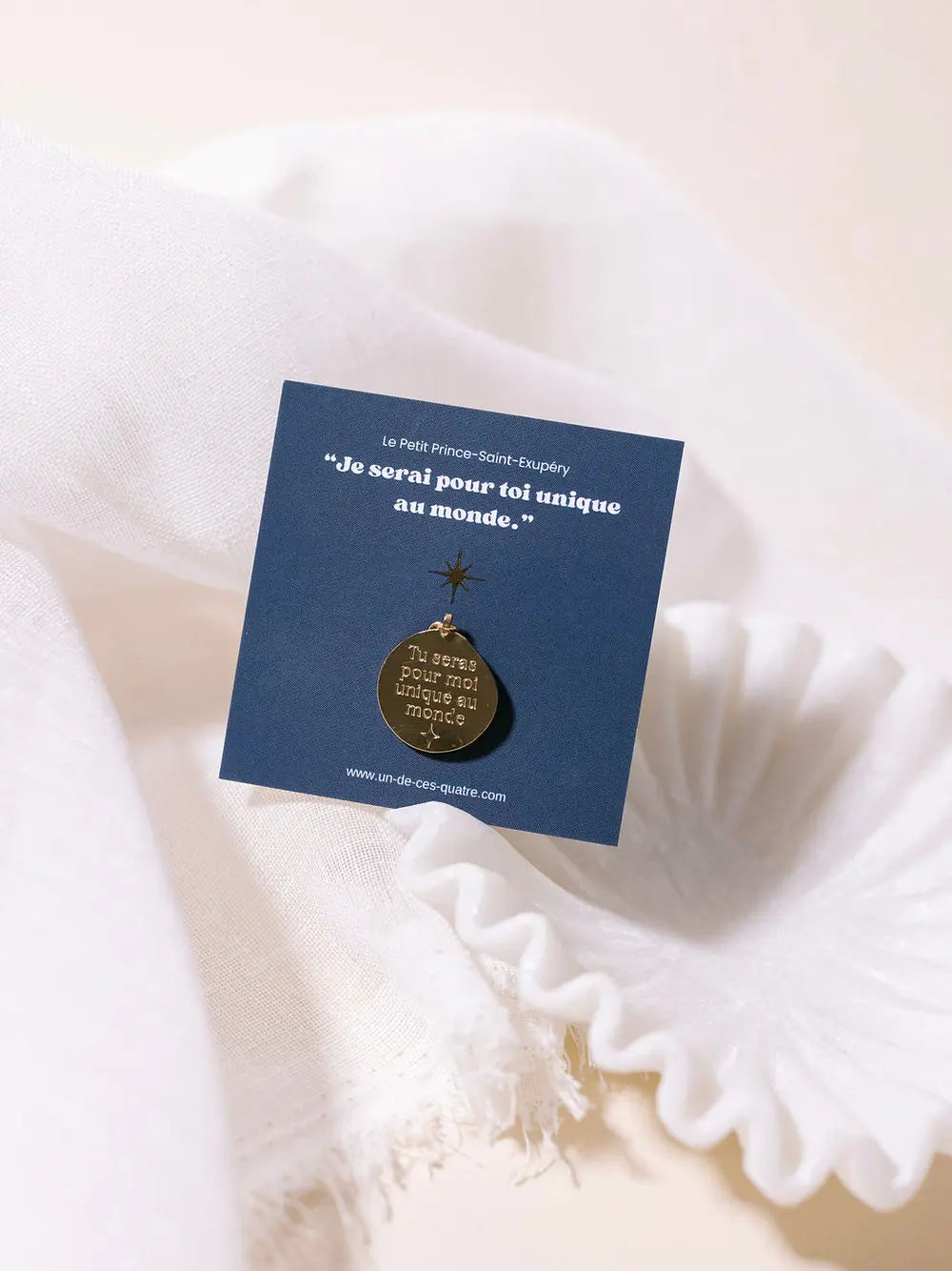 Pendentif "Unique au monde" Un de ces quatre 