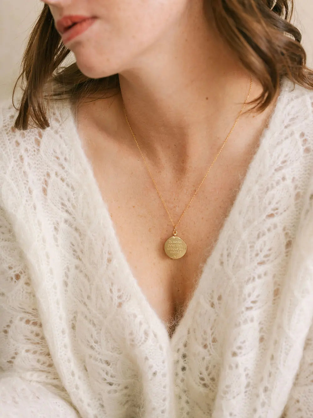 Pendentif "Unique au monde" Un de ces quatre 