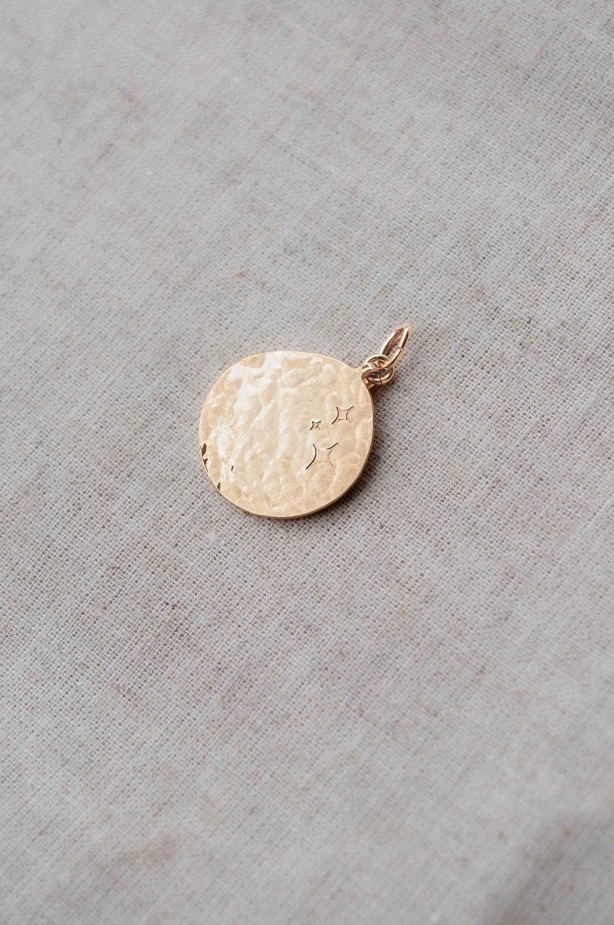 Pendentif "Unique au monde" Un de ces quatre 